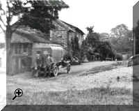 Village baker c1920, Jesse Pooley (left) with Chris Tweed (who was to become village baker) by the 'Old Bakery' with bread delivery van  > Simply click to enlarge... then use the [Back] button to return