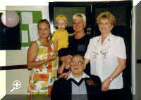 Gilbert Vincent's 90th birthday party 5/6/98 at village hall. l-r Lisa Gilbert (great grandaughter), Joshua Gilbert (great-great grandson), Elaine Pownall (grandaughter), Annabell Harris (daughter) and Gilbert