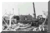 Crane erecting concrete uprights and roof beams 1957  > Simply click to enlarge... then use the [Back] button to return