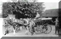 Butcher William Jennings, middle, with sons Harold, left and Wilfred on right. Driver George Moss in 1911. Taken at butchers shop at rear of shop in the street. Supplier to surrounding villages c1900  > Simply click to enlarge... then use the [Back] button to return